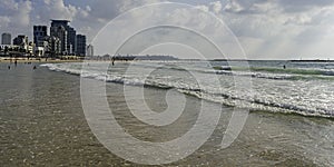 Sand, Surf, Bathers and Hotels on Tel Aviv Beach photo