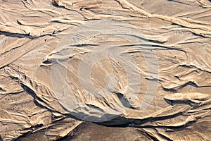 Sand surface with the relief formed by water currents