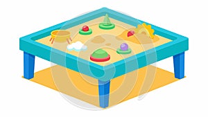A sand table with kinetic sand and tactile toys allowing children with fine motor skill difficulties to engage in