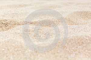 Sand texture background close up, sea sandy beach backdrop, white sand surface top view, yellow sand grains pattern, copy space