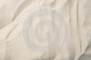 sand texture. Sandy beach for background In Summer Sun. Top view