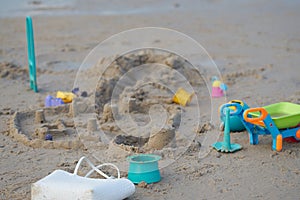 Sand toys on beach castle sand in summer concept