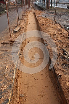 Sand trench for laying cable