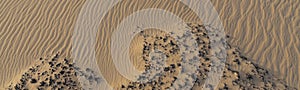 Sand wave pattern and typical dolerite deposits at the Black desert near Bahariya oasis
