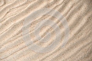Sand waves texture background. Sand on beach as background. top view