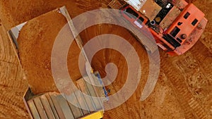 Sand work aerial view. Mining machinery at sand mine. Aerial view of mining sand