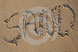 Sand written on beach