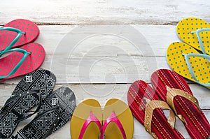 Sandal various styles on a wooden floor - lifestyles.