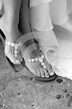 Sandals on bride's feet photo