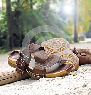 Sandals on sandy beach