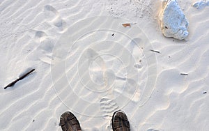 Sandals and White Sand Beach