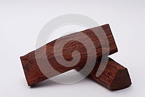 Sandalwood logs on white background