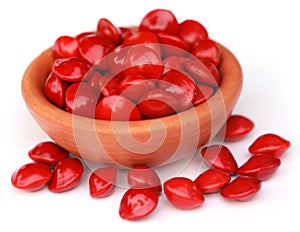 Sandalwood Seeds in a brown bowl photo