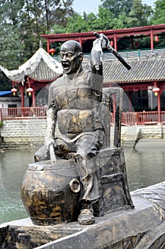 Sandaoyan, China: Bronze Dragon Boat Drummer