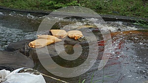 Sandbag dam to control water flow