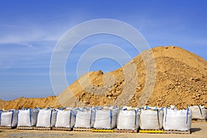 Sandbag white big bag sand sacks quarry photo