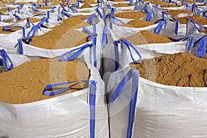 Sandbag white big bag sand sacks quarry photo