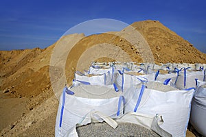 Sandbag white big bag sand sacks quarry photo