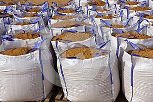 Sandbag white big bag sand sacks quarry photo