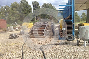 Sandblasting process. Cleaning the metal construction surface from rust before painting.