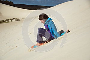 Sandboard surfing
