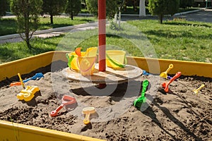 Sandbox in a kindergarten with toys for playing in the sand