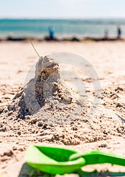 Sandcastle and spade