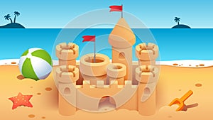 Sandcastle with towers on empty summer sea beach