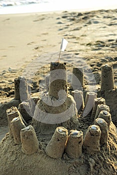 Sandcastle with a White Flag