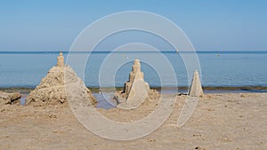 Sandcastles on the beach of Kolobrzeg in Poland