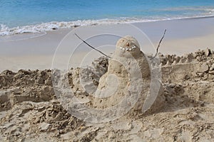 Sandman on a beach in Antigua Barbuda photo