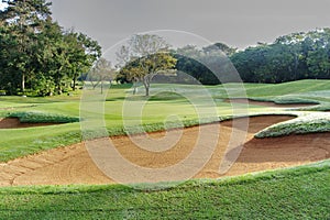 sandpit bunker golf course backgrounds, The sandpit on the golf course fairway is used as a hurdle for athletes to compete