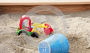 Sandpit with toys