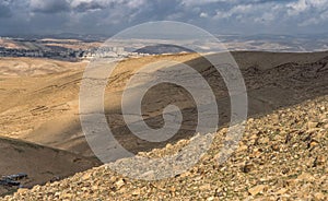 Sands and rocks in Judean desert on a sunny day, Israel