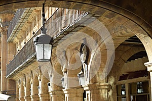 Sandstone arches with hanging lantern.