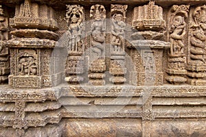 Sandstone carvings on the walls of the ancient 13th century sun temple at Konark, Odisha, India. Incredible India