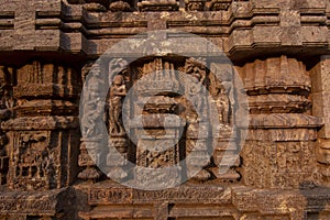 Sandstone carvings on the walls of the ancient 13th century sun temple at Konark, Odisha, India. Incredible India