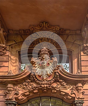 Sandstone city coat of arms above the entrance of a house in Kaiserstrasse, Frankfurt, Germany