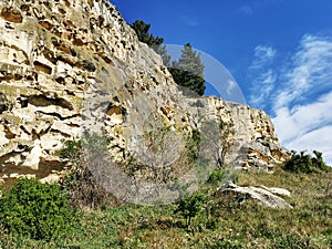 Sandstone cliff at Maori rock art site in New Zealand