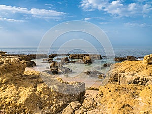 Sandstone coastline with sandy beaches at Gale