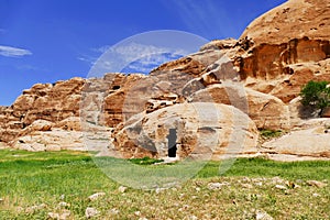 Sandstone Hills and Rock-Cut Structure in Little Petra, Jordan