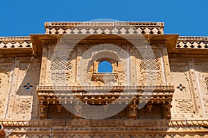 Sandstone made beautiful balcony,  jharokha, stone window and exterior of Rani Mahal or Rani Ka Mahal, inside Jaisalmer fort.