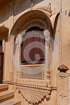 Sandstone made beautiful balcony,  jharokha, stone window and exterior of Rani Mahal or Rani Ka Mahal, inside Jaisalmer fort.