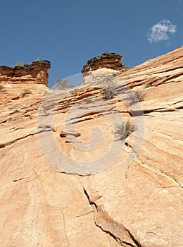 Sandstone Mountain Formation with Blue Sky and Clouds