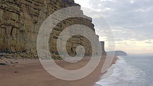 Sandstone Rock Formation Cliff Along West Bay in England