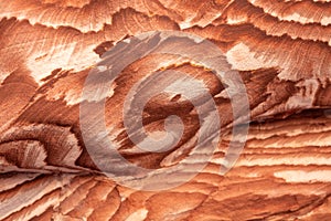 Sandstone rock and mineral layers in Petra, Jordan