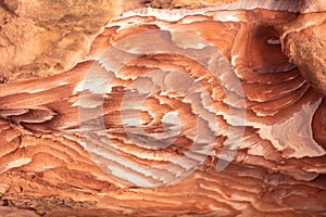 Sandstone rock and mineral layers in Petra, Jordan