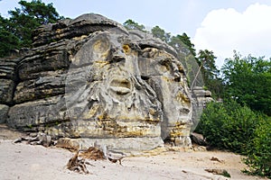 Sandstone rock sculptures Devils Heads near Zelizy, Czech Republic