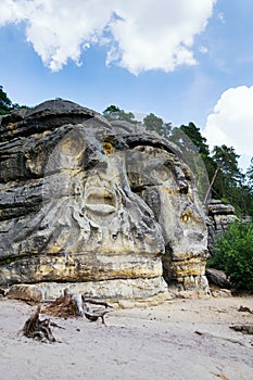 Sandstone rock sculptures Devils Heads near Zelizy, Czech Republic