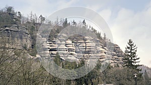 Sandstone rocks, rock massifs in forest. Climbing landscape in Germany, big stones.